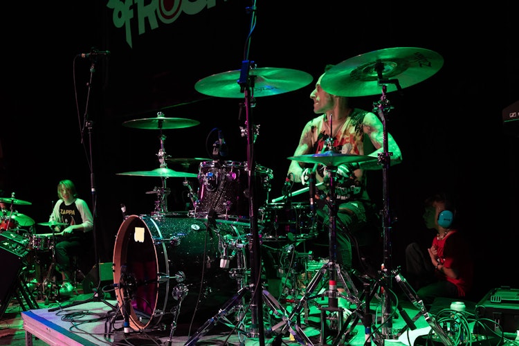School of Rock student drummer performs alongside drummer Frank Zummo