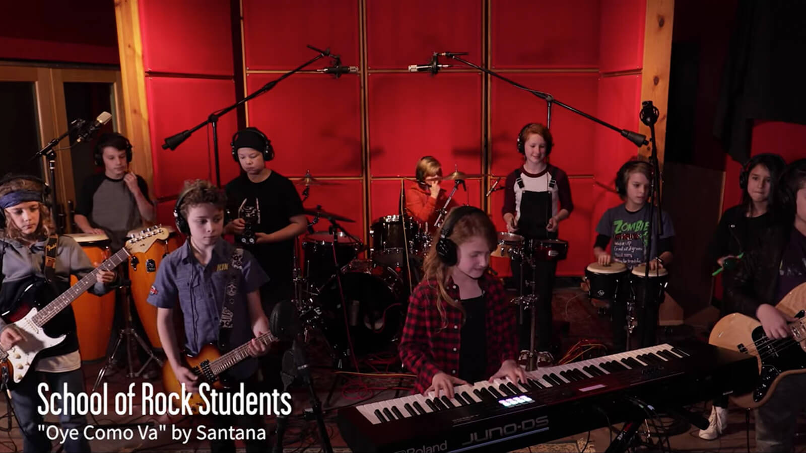 School of Rock students recording Oye Como Va by Santana in the studio