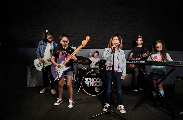 Students playing in the rookies music program